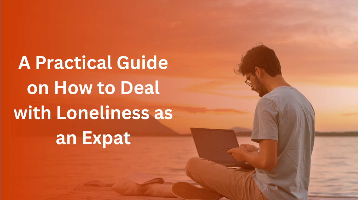 Expat man on laptop by sunset – dealing with loneliness